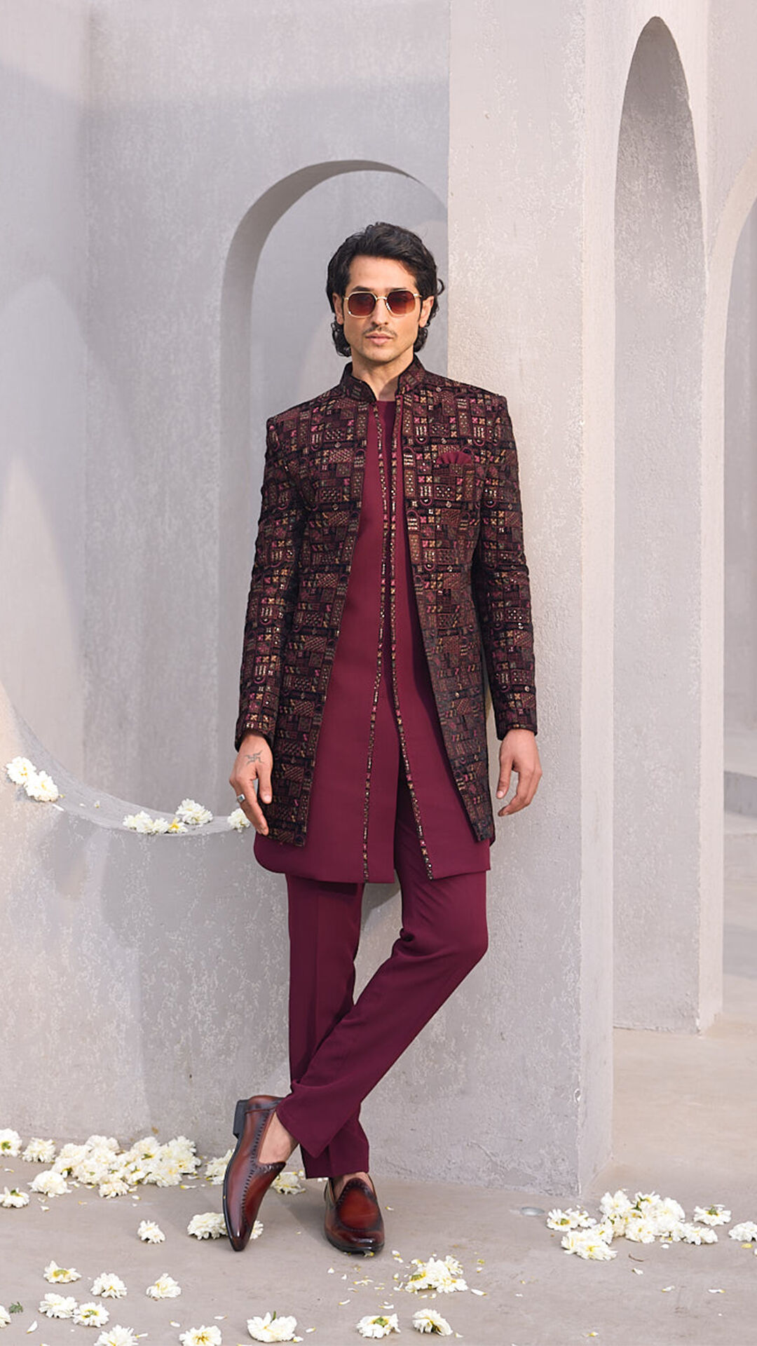 Groom in elegant stylish indo western sherwani